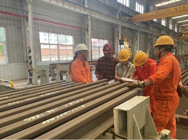 Pictures of workers inspecting spare parts Pictures of workers inspecting spare parts