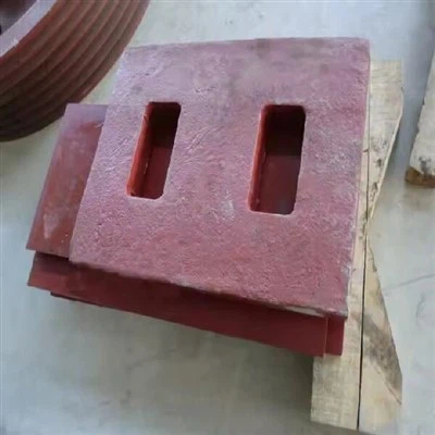 What is the role of the rotor in crusher parts?